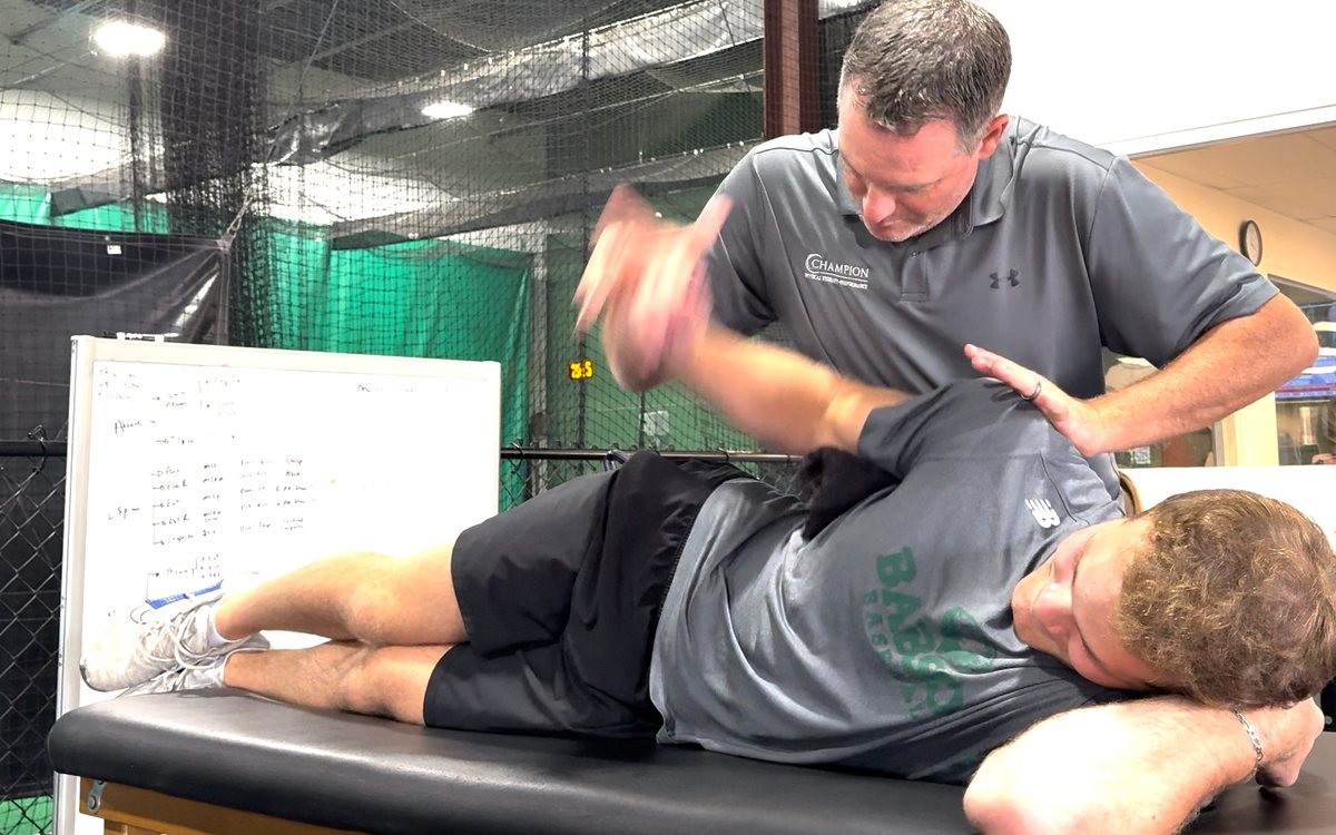 Rotator cuff strengthening: sidelying external rotation with the therapist cueing the shoulder blade